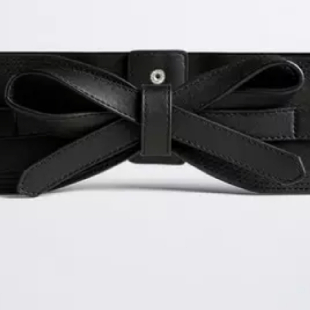 TORRID Faux Leather Elastic Snap Back Belt